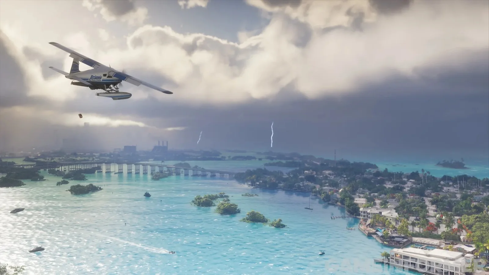 Un hydravion survolant les Leonida Keys avec un front orageux et des éclairs au loin