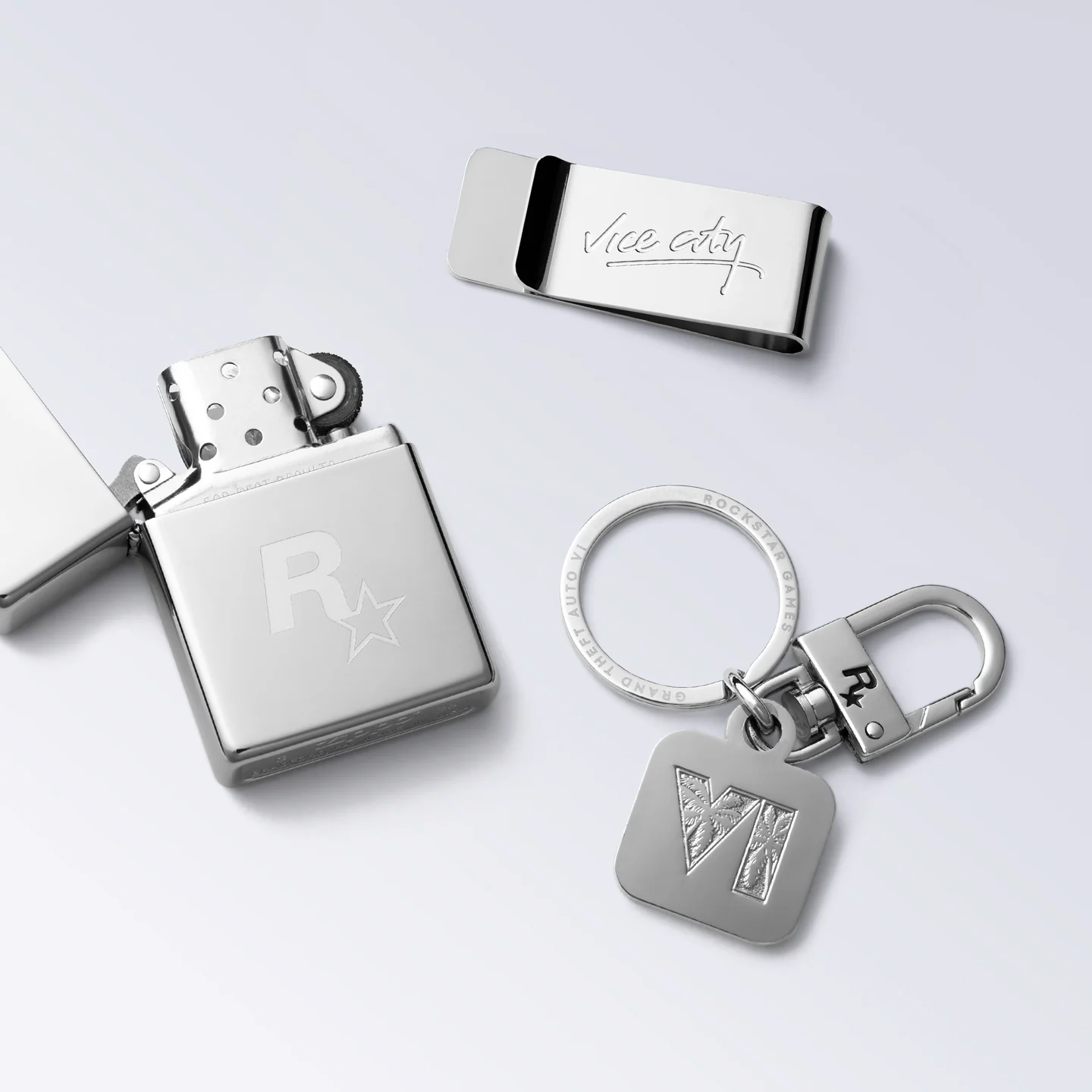 Chrome GTA 6 keychain, money clip and Zippo lighter